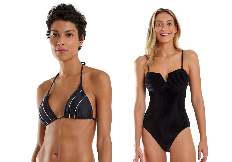 Duas mulheres uma a frente da outra, uma veste biquíni cortininha e outra maio preto