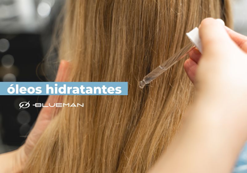 oleos hidratantes pessoa passando oleos hidratantes no cabelo loiro